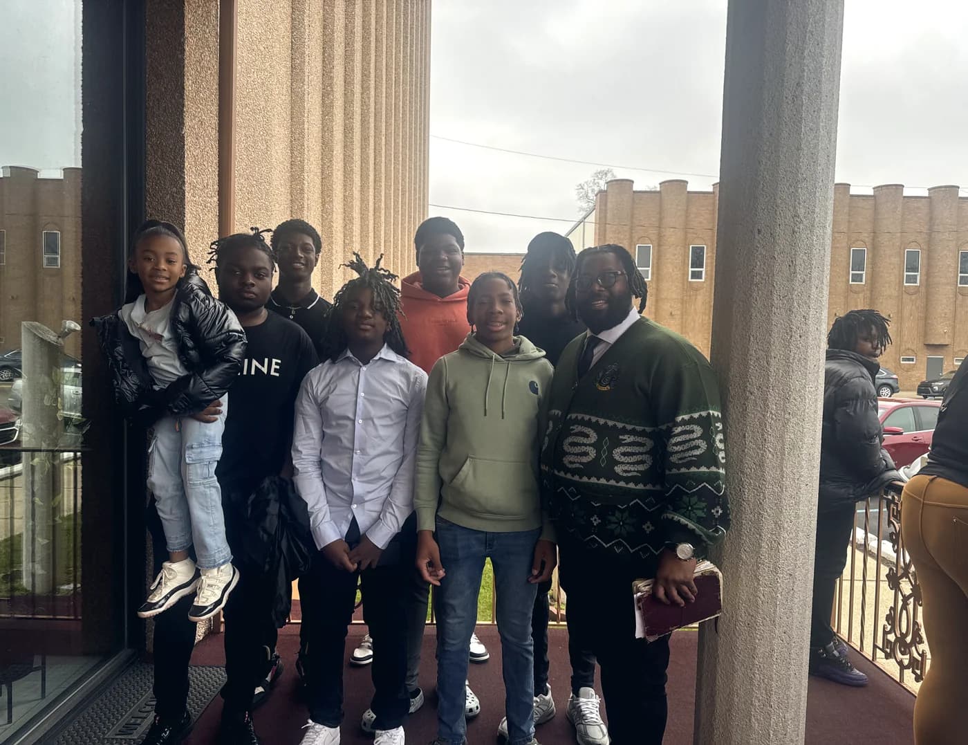 Bobby Christian with a group of young men