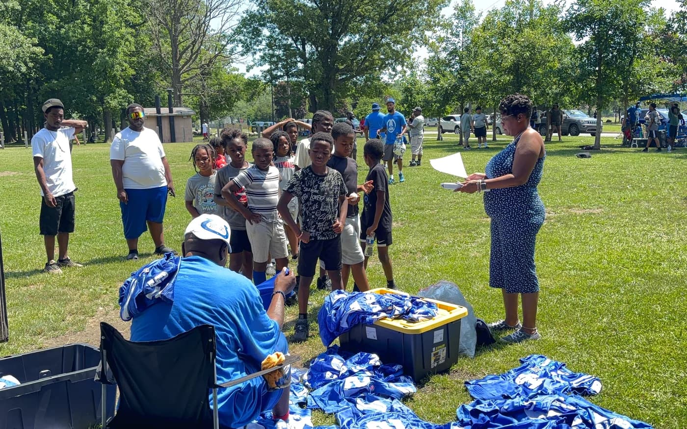 Volunteers setting up for a community day in Detroit
