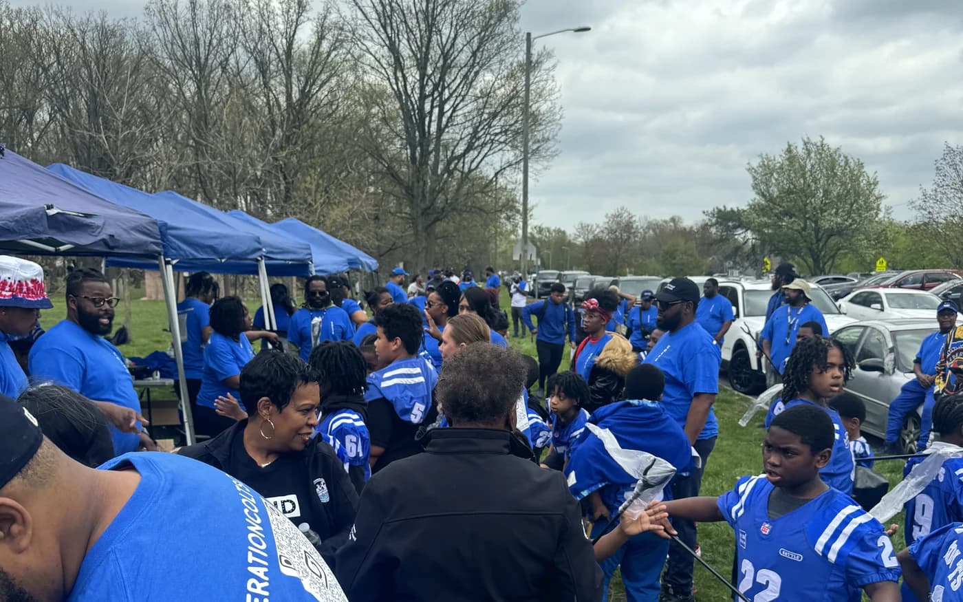 Detroit families and volunteers at a community event